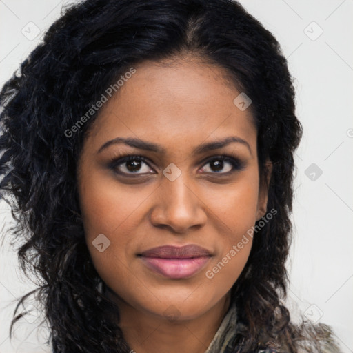 Joyful black young-adult female with long  brown hair and brown eyes