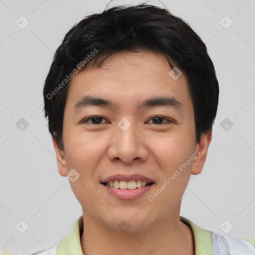 Joyful asian young-adult male with short  black hair and brown eyes