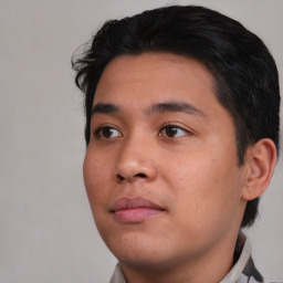 Neutral asian young-adult male with short  brown hair and brown eyes