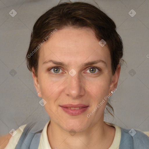 Joyful white adult female with short  brown hair and grey eyes