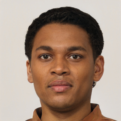 Neutral black young-adult male with short  black hair and brown eyes