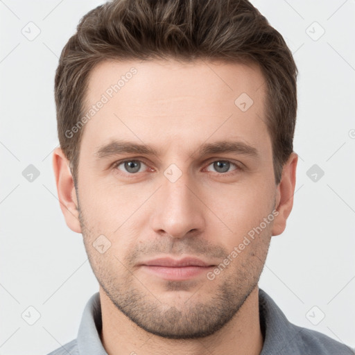 Neutral white young-adult male with short  brown hair and grey eyes