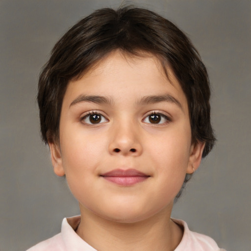 Joyful white child female with short  brown hair and brown eyes