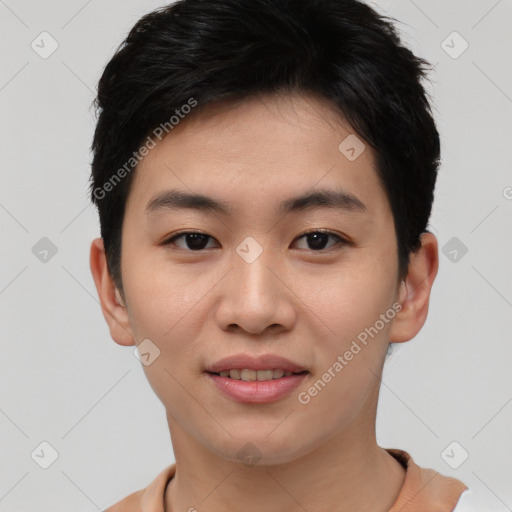 Joyful asian young-adult female with short  black hair and brown eyes