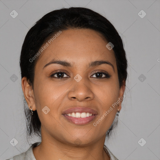 Joyful latino young-adult female with medium  brown hair and brown eyes