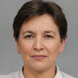 Joyful white adult female with short  brown hair and brown eyes