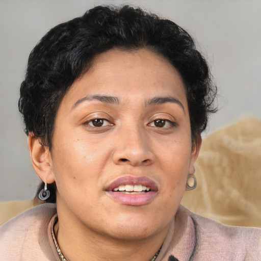Joyful asian adult female with short  brown hair and brown eyes