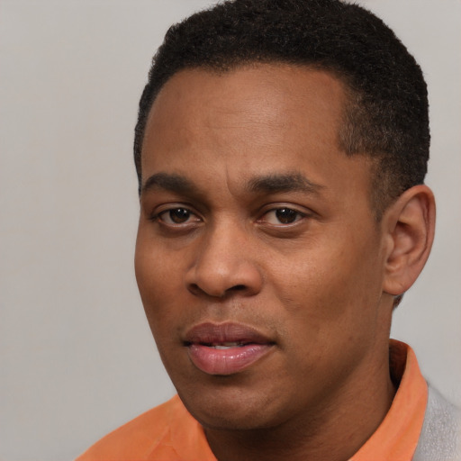 Neutral black young-adult male with short  brown hair and brown eyes