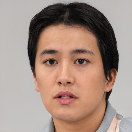 Neutral asian young-adult male with short  black hair and brown eyes