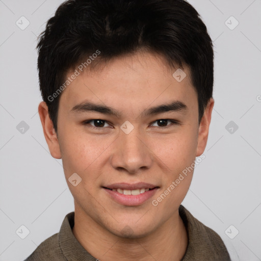 Joyful asian young-adult male with short  brown hair and brown eyes