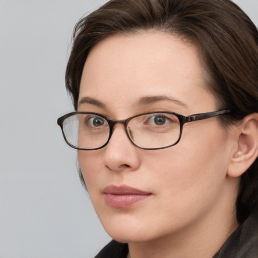 Neutral white young-adult female with medium  brown hair and grey eyes