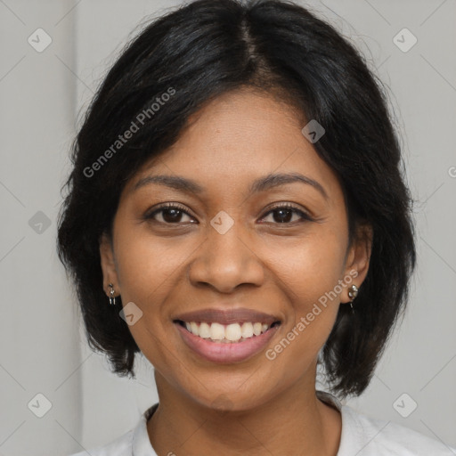 Joyful black young-adult female with medium  black hair and brown eyes