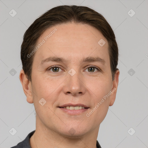 Joyful white adult male with short  brown hair and grey eyes