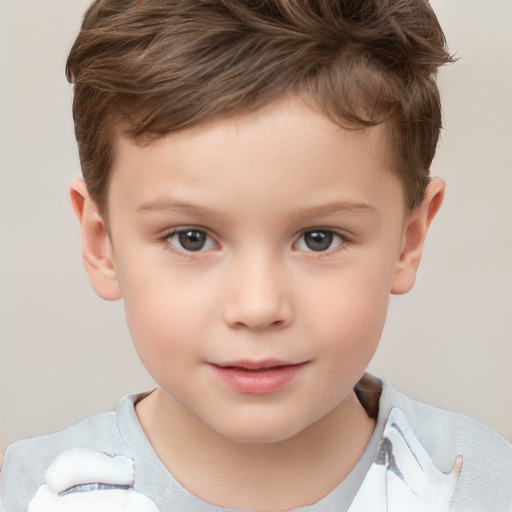 Joyful white child male with short  brown hair and brown eyes