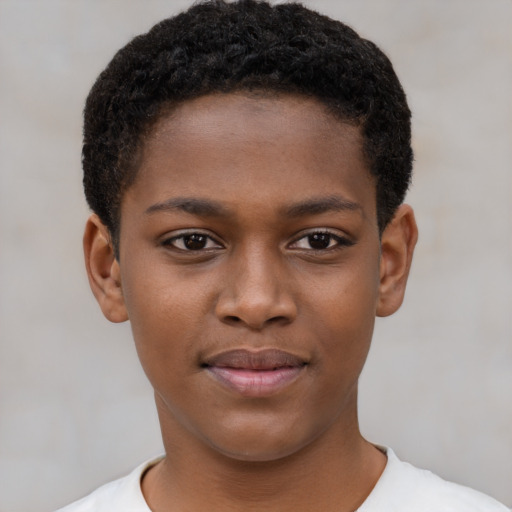 Joyful black child female with short  brown hair and brown eyes