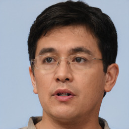 Neutral white adult male with short  black hair and brown eyes