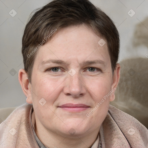 Joyful white adult female with short  brown hair and grey eyes