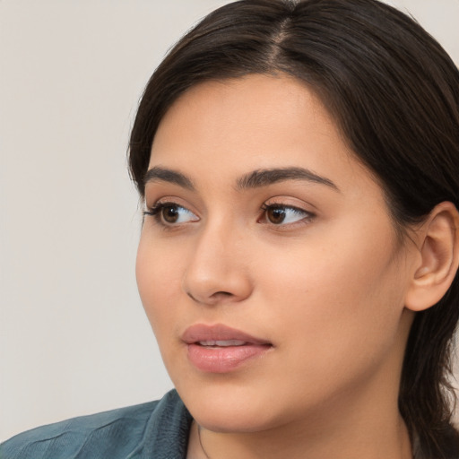 Neutral white young-adult female with medium  brown hair and brown eyes