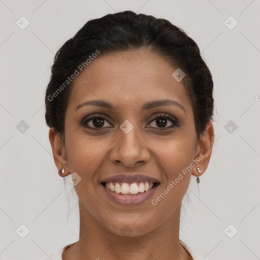 Joyful latino young-adult female with short  brown hair and brown eyes