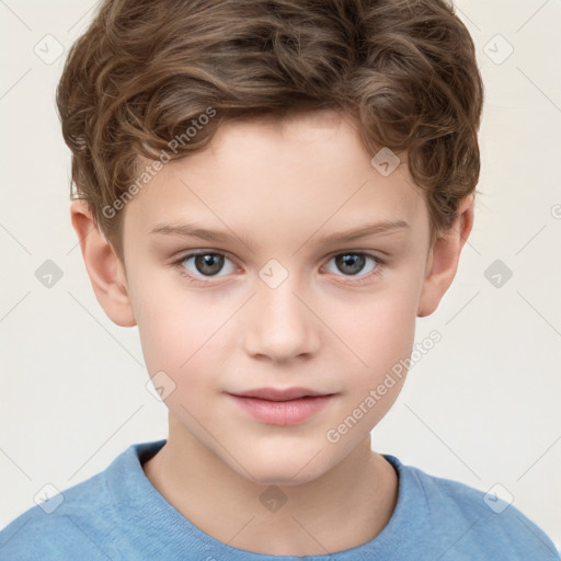 Joyful white child male with short  brown hair and grey eyes