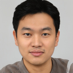 Neutral asian young-adult male with short  black hair and brown eyes