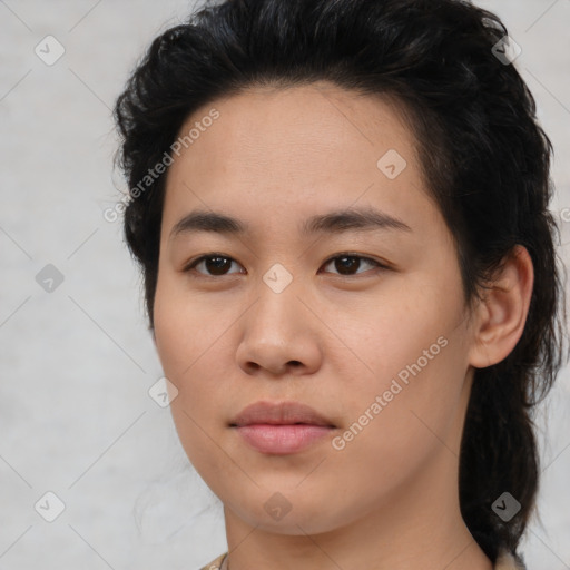 Joyful asian young-adult female with medium  black hair and brown eyes