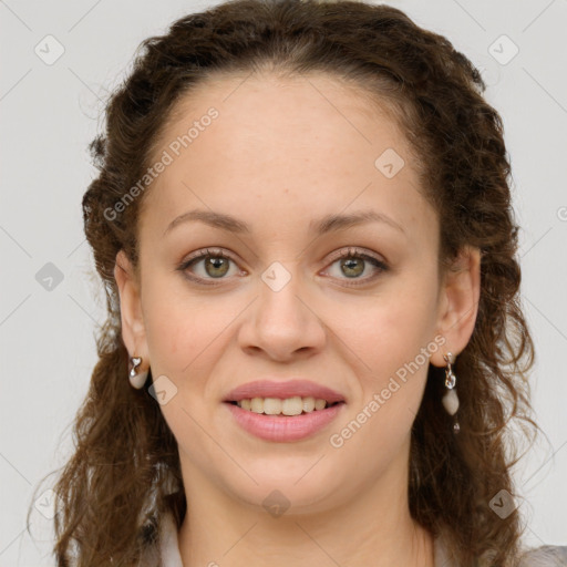 Joyful white young-adult female with medium  brown hair and green eyes