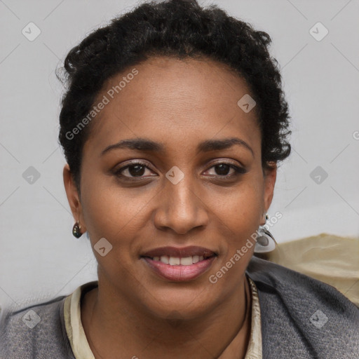 Joyful black young-adult female with short  brown hair and brown eyes