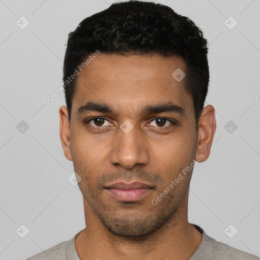 Neutral latino young-adult male with short  black hair and brown eyes