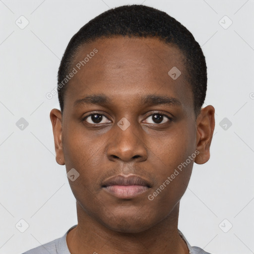 Neutral black young-adult male with short  brown hair and brown eyes