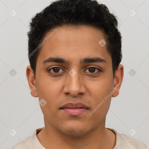 Neutral latino young-adult male with short  brown hair and brown eyes