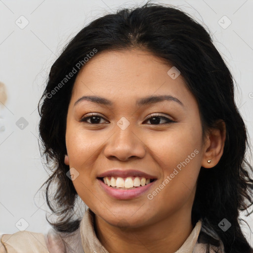 Joyful asian young-adult female with long  brown hair and brown eyes