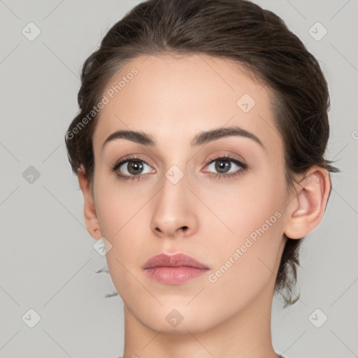 Neutral white young-adult female with medium  brown hair and brown eyes