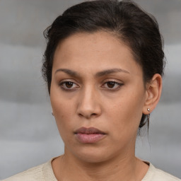 Neutral white young-adult female with short  brown hair and brown eyes