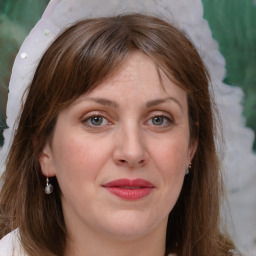 Joyful white adult female with medium  brown hair and grey eyes