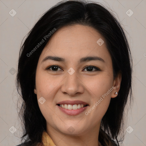 Joyful latino young-adult female with medium  brown hair and brown eyes