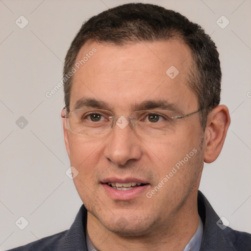 Joyful white adult male with short  brown hair and brown eyes