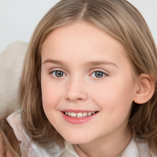 Joyful white child female with medium  brown hair and grey eyes