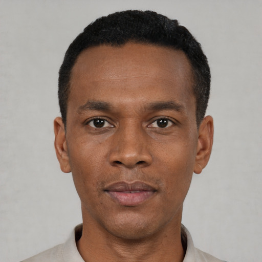 Neutral black young-adult male with short  black hair and brown eyes