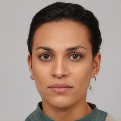 Neutral latino young-adult female with short  black hair and brown eyes