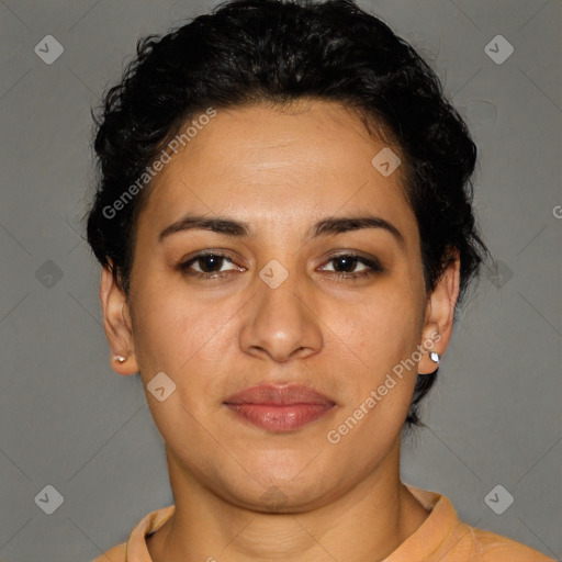 Joyful latino young-adult female with short  brown hair and brown eyes