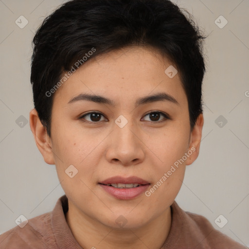 Joyful asian young-adult female with short  brown hair and brown eyes