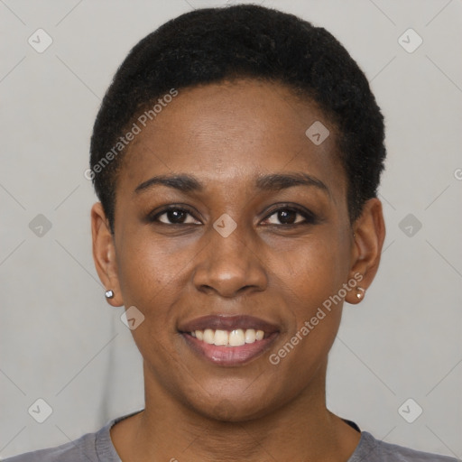 Joyful black young-adult female with short  black hair and brown eyes