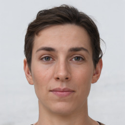 Neutral white young-adult female with short  brown hair and brown eyes