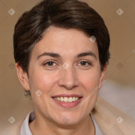 Joyful white adult female with short  brown hair and brown eyes