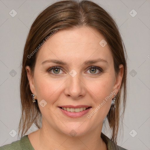 Joyful white young-adult female with medium  brown hair and grey eyes