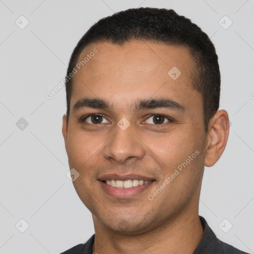Joyful white young-adult male with short  black hair and brown eyes