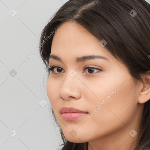 Neutral latino young-adult female with medium  brown hair and brown eyes