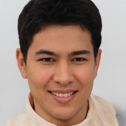 Joyful latino young-adult male with short  brown hair and brown eyes