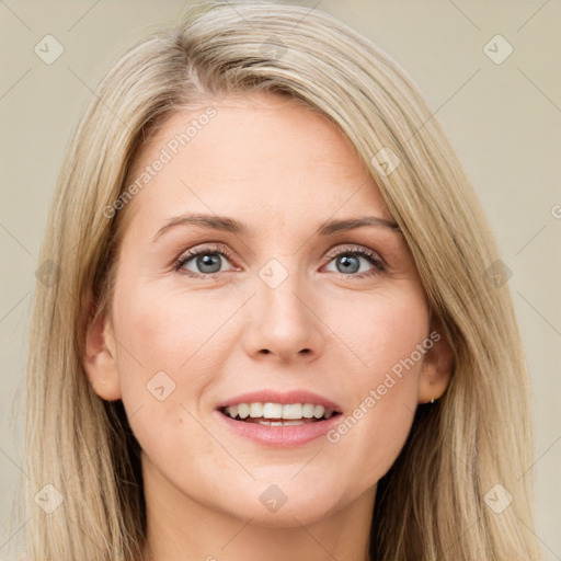 Joyful white young-adult female with long  brown hair and blue eyes